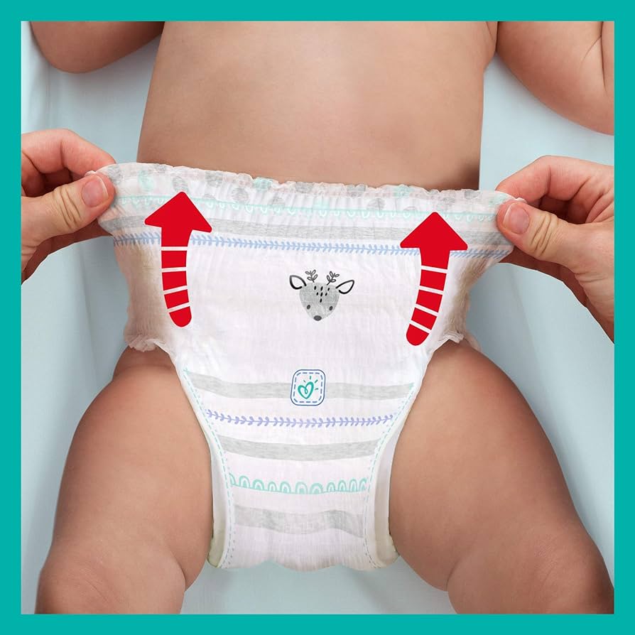 zakladanie pieluchy pampers